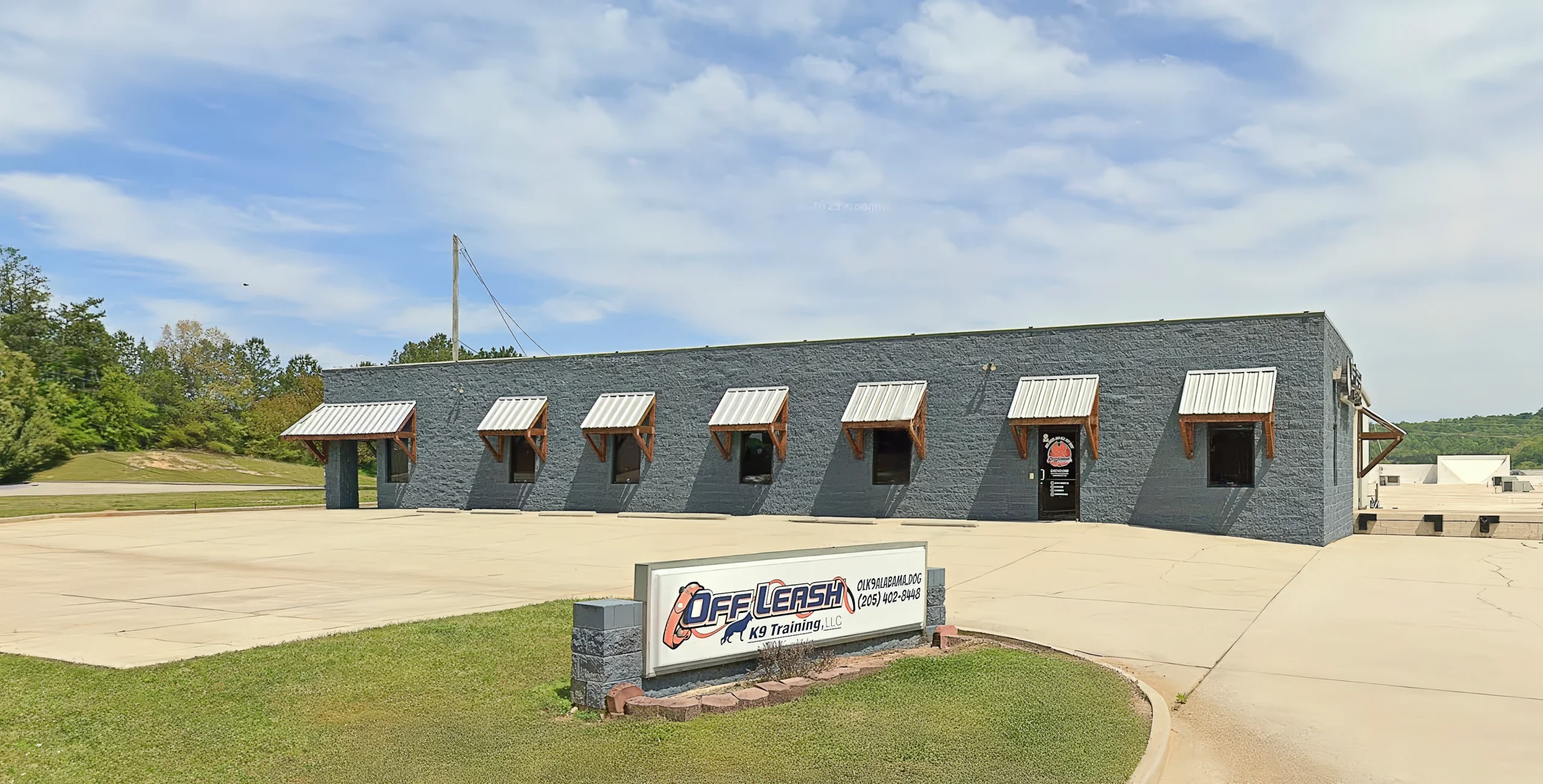Off Leash K9 Training Birmingham facility storefront in Pelham, Alabama - professional dog training center